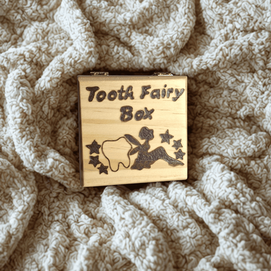 Small wooden box with hand burnt inscription, Tooth Fairy Box and a Silhouette of a fairy sitting against a tooth surrounded by stars