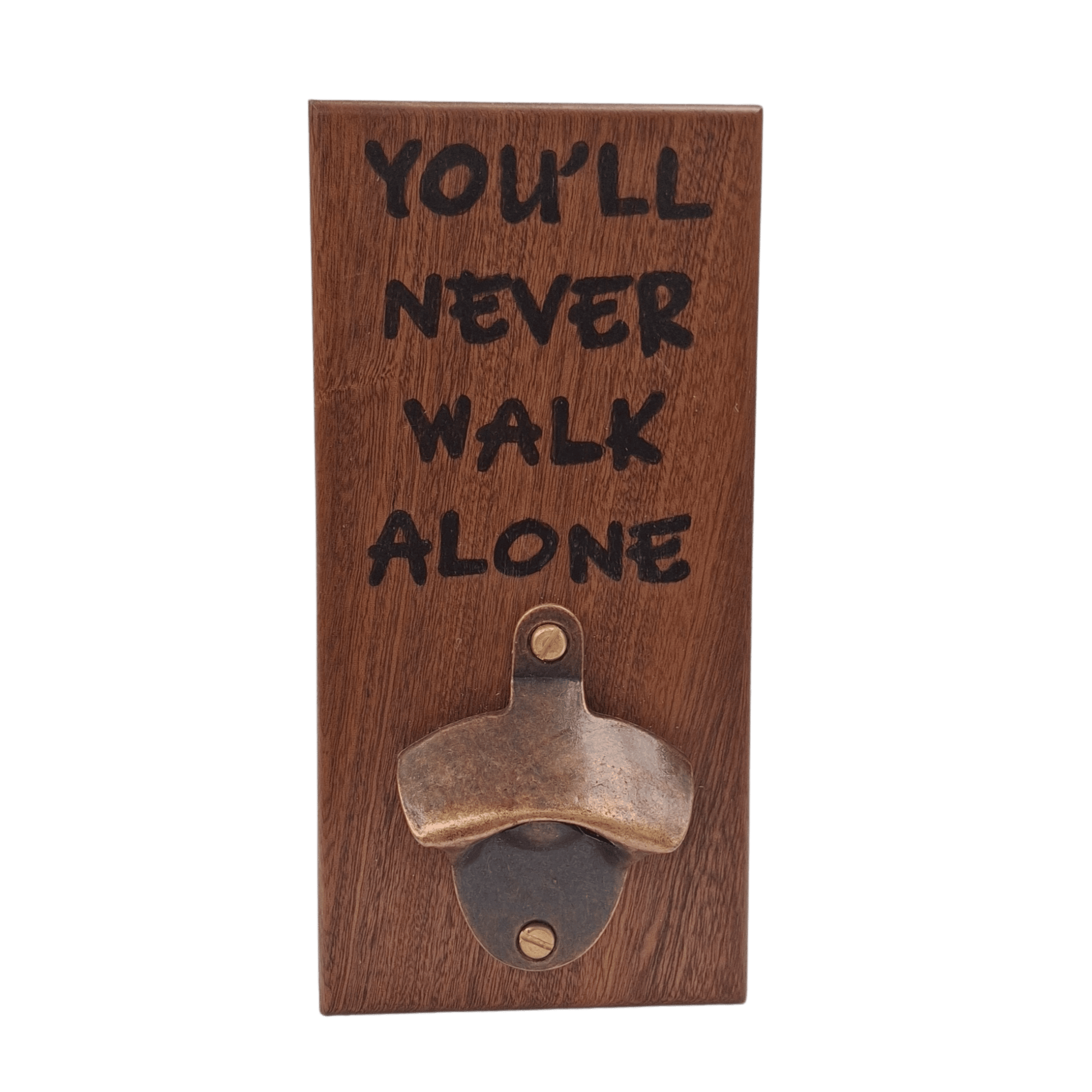 Wall-mounted bottle opener made from dark-grained wood (sapele). The text "YOU'LL NEVER WALK ALONE" is applied using pyrography (hand burnt lettering). A vintage-style metal opener is secured at the bottom of the plaque.