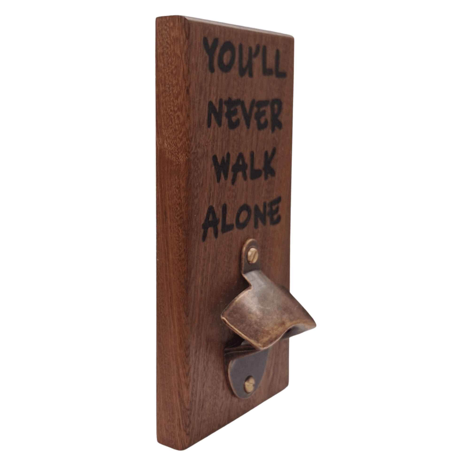 Wall-mounted bottle opener made from dark-grained wood (sapele). The text "YOU'LL NEVER WALK ALONE" is applied using pyrography (hand burnt lettering). A vintage-style metal opener is secured at the bottom of the plaque.